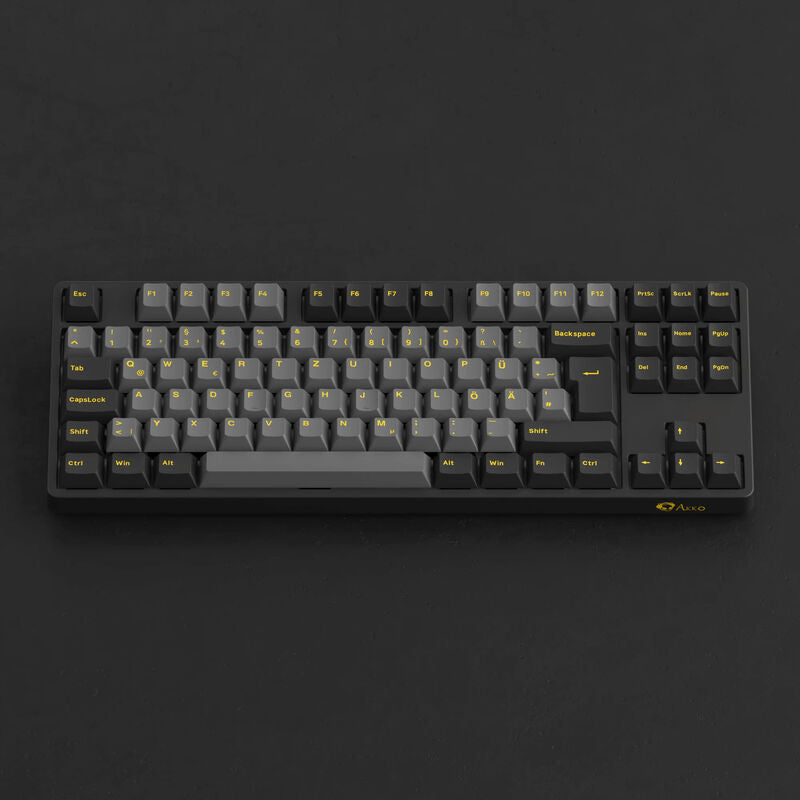 Akko Black & Gold 5087S V1 gamingtastatur TKL montert på skrivebord