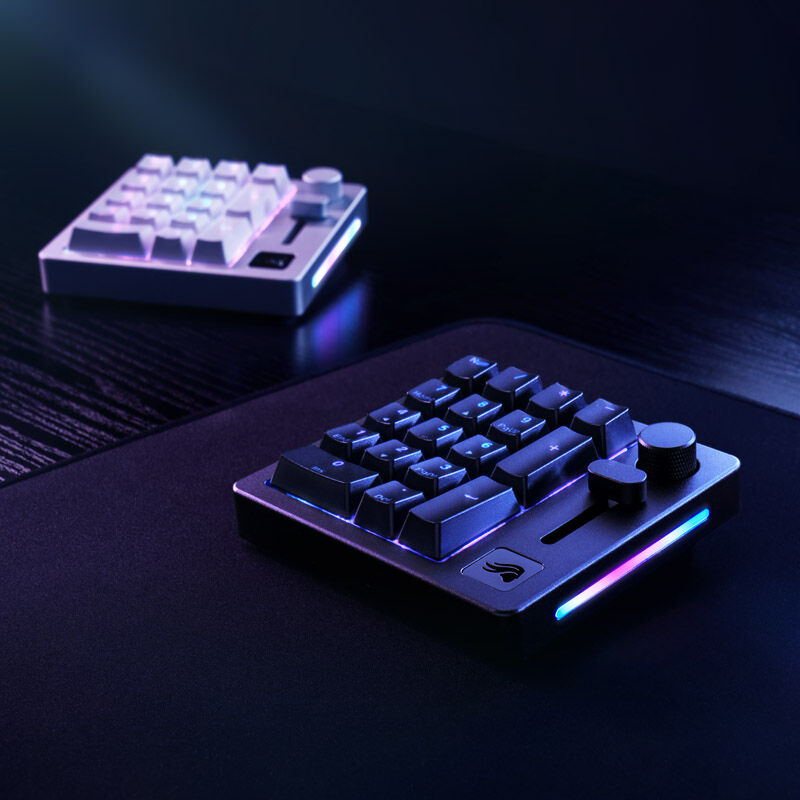 Glorious GMMK Wireless Numpad mekanisk Fox Switches svart med tastatur i bakgrunnen